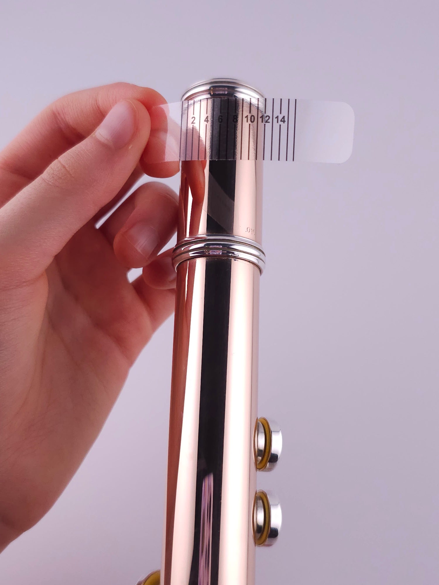 Place the Sixteenth Inch label on underside of flute body